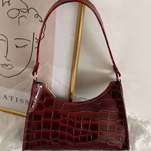 Burgundy faux croc shoulder bag